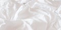 White bed sheet blanket, wrinkled duvet, crumpled comforter cloth used in hotel, resort or home interior for bedding background