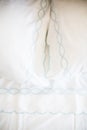 White bed sheets on bed Royalty Free Stock Photo