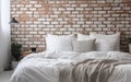 White bed sheets and pillows and white wall Royalty Free Stock Photo