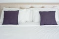 White bedding and grey pillow on the bed in hotel room Royalty Free Stock Photo