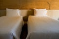 White bedding and pillow in hotel room Royalty Free Stock Photo