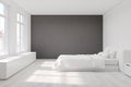 White bedroom with a gray wall Royalty Free Stock Photo