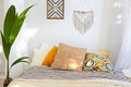 White and beige bedroom in boho style Royalty Free Stock Photo