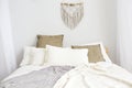 White and beige bedroom in boho style Royalty Free Stock Photo