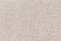 White, beige flaxen background. Fabric or texture