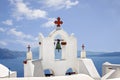 White belfry in the Santorini Island, Cyclades in Greece. Royalty Free Stock Photo