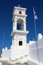 White bell tower with blue dome of Greek orthodox church in Thira, Santorini, Greece Royalty Free Stock Photo