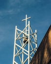 White Bell Tower with Cross at Top Royalty Free Stock Photo