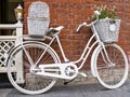 White bicycle-bags on brick wall background Royalty Free Stock Photo