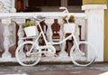 White Bicycle With Beautiful Flower Basket Royalty Free Stock Photo