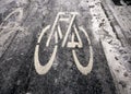 White bicycle symbol on cycle path in winter Royalty Free Stock Photo