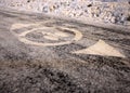 White bicycle symbol on cycle path covered in snow in winter Royalty Free Stock Photo