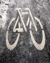 White bicycle symbol on cycle path in winter Royalty Free Stock Photo