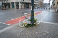 a white bicycle at a traffic light commemorates a fatal bicycle accident