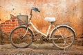 White bicycle and wall