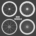 White bicycle wheel symbols collection. Bike rubber tyre silhouettes. Fitness cycle, road and mountain bike. Vector Royalty Free Stock Photo