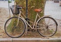 White bicycle on wood background, vintage style Royalty Free Stock Photo