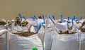 White big bags full with potting soil, horticulture and agriculture industry, logistic background Royalty Free Stock Photo