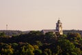 A white big church on a hill between trees Royalty Free Stock Photo