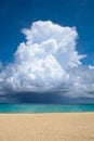 White big cloud over ocean and white sand beach Royalty Free Stock Photo