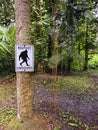 White Big Foot Crossing Sign in Forest