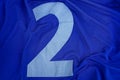 Big number two on blue cloth sports uniforms