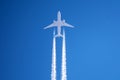 White big passenger airplane two engines aviation airport contrail clouds. Royalty Free Stock Photo