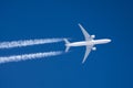 White big passenger airplane two engines aviation airport contrail clouds. Royalty Free Stock Photo