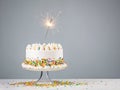 White Birthday Cake with Sparkler Royalty Free Stock Photo