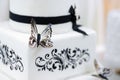 White and black butterfly wedding cake