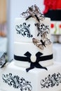 White and black butterfly wedding cake