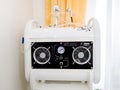 White black color peeling apparatus in beauty salon. Medical equipment, systems and devices for aesthetic medicine and cosmetology