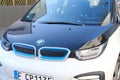 white, black compact city car i3, first mass-produced electric car German company BMW, concept minimizing environmental impact,