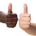 White and black hand doing thumbs up. Royalty Free Stock Photo