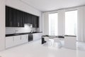 White and black kitchen corner, bar and cupboards