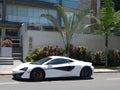 White and black McLaren 570S coupe parked in Lima