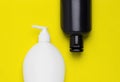 White and black packaging for hygiene products. Plastic bottles