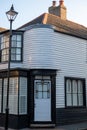 White and black painted wooden fisherman`s house in historic Addington Street, Ramsgate, Kent UK. Royalty Free Stock Photo