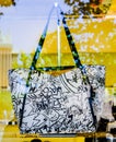 White with black pattern bag by Michael Kors in Madrid