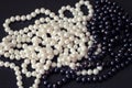 White and black pearls necklaces Royalty Free Stock Photo