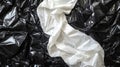 White and Black Plastic Sheets Draped Together Royalty Free Stock Photo