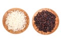 White and black rice grains in wooden bowl isolated on white background. Top view. Flat lay Royalty Free Stock Photo