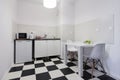 White and black small kitchen interior design Royalty Free Stock Photo