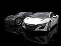 White and black super sports cars side by side in a black showroom