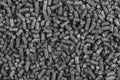 White and black wood pellets texture background. natural pile of wood pellets. organic biofuels. Alternative biofuel from sawdust Royalty Free Stock Photo