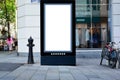 blank white lightbox ad panel along sidewalk. outdoor advertising sign panel. pedestrians on the sidewalk Royalty Free Stock Photo