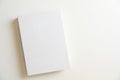 White blank book cover for montage on white background. Top view