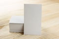 White blank business visit card, gift, ticket, pass, present close up on wooden background. Copy space corporate Royalty Free Stock Photo