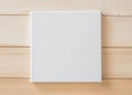 White blank canvas mockup square size on wood for arts painting and photo hanging interior decoration Royalty Free Stock Photo