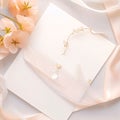 A white blank card with a bright bow tied around it. Around it white flower petals. Valentine\'s Day as a day symbol of affe Royalty Free Stock Photo